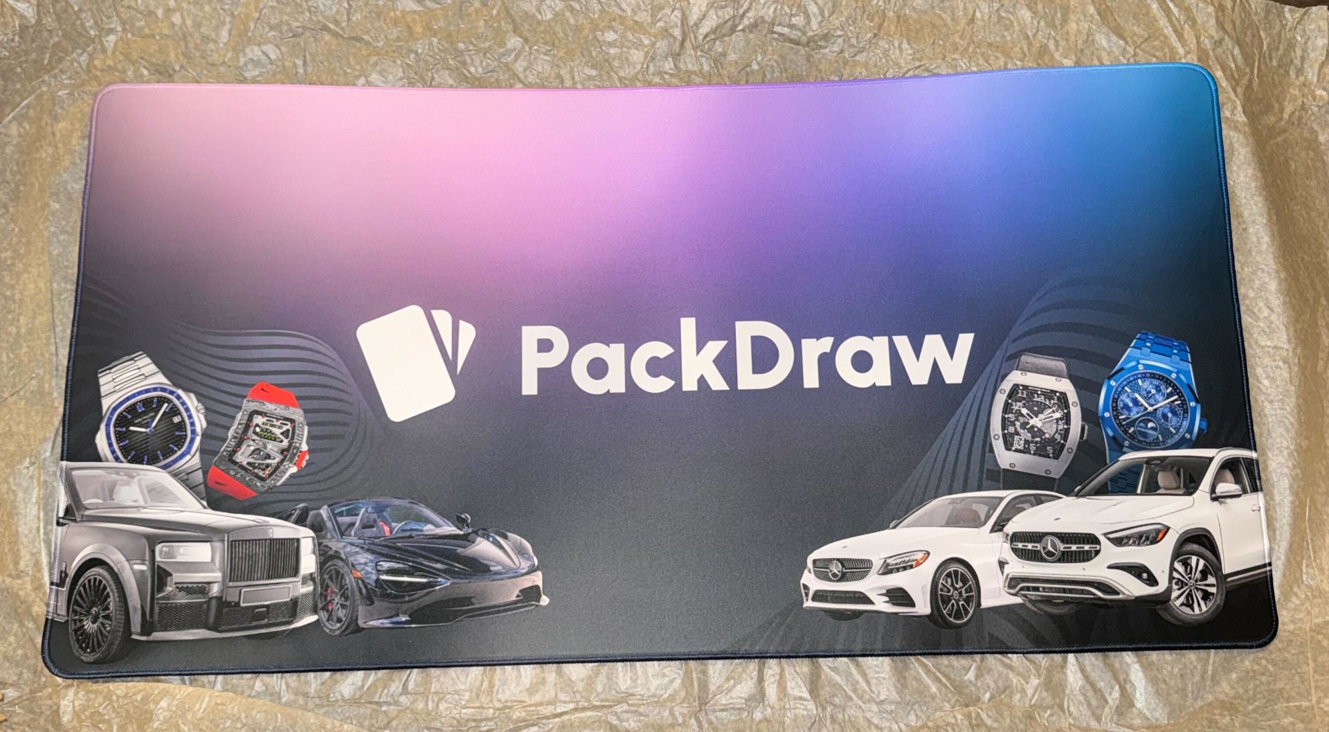 PackDraw luxury desk mat with watches and supercars